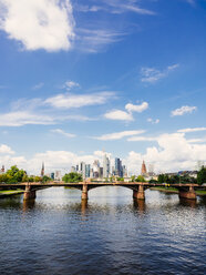 Germany, Frankfurt, view to skyline with Ignatz-Bubis-Bridge and Main River in the foreground - KRPF02045