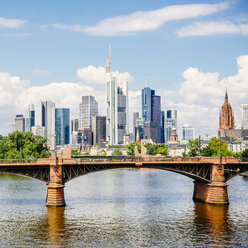 Germany, Frankfurt, view to skyline with Ignatz-Bubis-Bridge and Main River in the foreground - KRPF02046