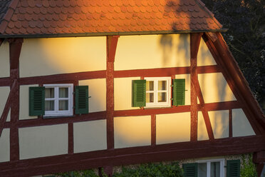 Germany, Noerdlingen, facade of half-timbered house at Loepsinger Mauer at sunset - SIEF07168