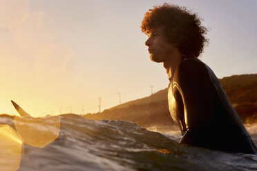 Surfer in the sea at sunset - WESTF22070