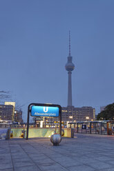 Germany, Berlin, view to television tower with underground sign in the foreground - GFF00881