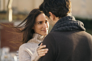 Portrait of happy woman face to face with her partner - KKAF00111