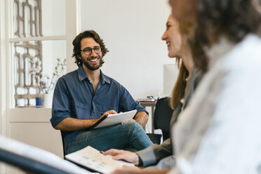 Business people discussing in work meeting - EBSF01997