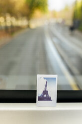 France, Paris, instant picture of the Eiffel Tower on a tourist bus - MGOF02659