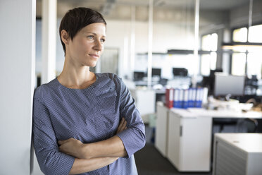 Businesswoman in office thinking - RBF05228