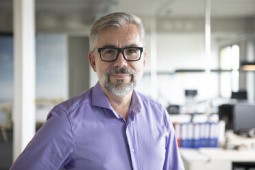 Portrait of confident businessman in office - RBF05326