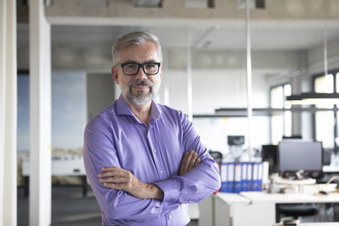 Portrait of confident businessman in office - RBF05327