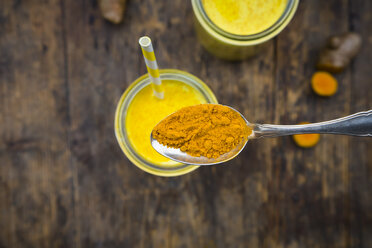 Curcuma powder on tea spoon, close-up - LVF05656