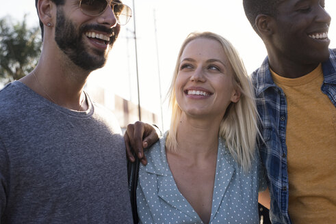 Three happy friends outdoors - WEST22170