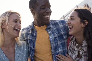 Three happy friends outdoors - WEST22171