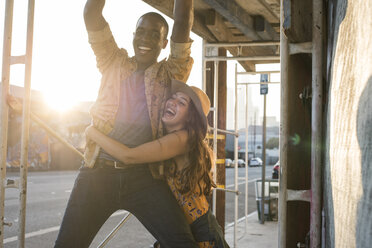 Happy young couple outdoors - WEST22182