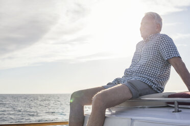 Smiling senior man on a boat trip - WESTF22282