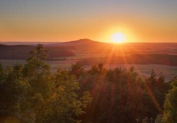 Germany, Bavaria, Franconia, sunset above the Hesselberg as seen from Spielberg castle - SIEF07201