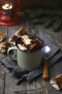 Hot chocolate with fire-roasted marshmallows on wooden table - RTBF00553