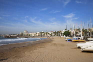 Spain, Catalonia, Sitges, coastal town and beach at Mediterranean Sea - ABOF00140