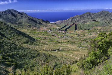 Spain, Tenerife, View into the valley of El Palmar and a hill that has been dug away for topsoil - DSGF01325