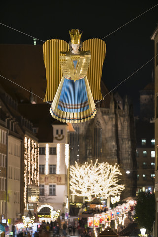 Germany, Nuremberg, angel figurine hanging over Christkindlmarkt stock photo