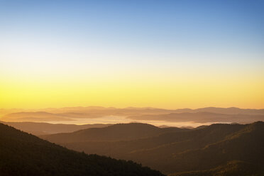 USA, North Carolina, view from Blue Ridge Parkway to Pisgah Forest at early morning mist - SMAF00629