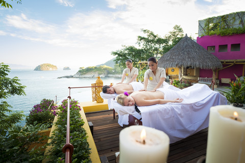 Luxury vacation with massage on ocean front terrace stock photo