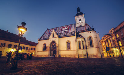 Croatia, Zagreb, view to St.Mark's Church in the evening - LCUF00087