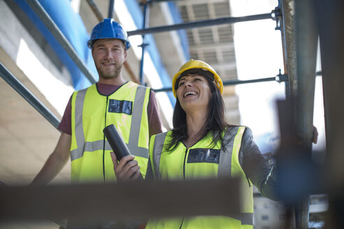 Two engineers inspecting construction site - ZEF11888