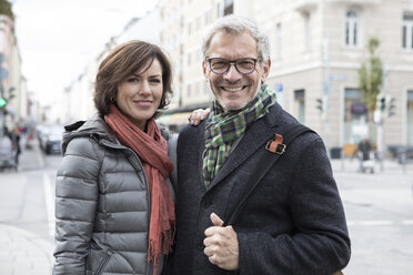 Portrait of smiling mature couple outdoors - RBF05353