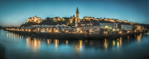 Germany, Burghausen, view to the lighted city with River Salzach in the foreground - HAMF00247