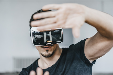 Man wearing VR glasses stock photo