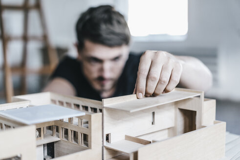 Architect working on architectural model - KNSF00861