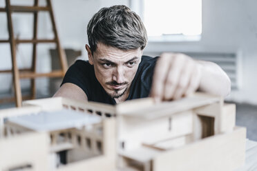 Architect working on architectural model - KNSF00862