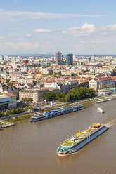 Slovakia, Bratislava, cityscape with river cruise ship on the Danube - WD03815