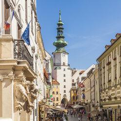 Slovakia, Bratislava, shops and restaurants at Michalska ulica with Michael's Gate - WD03820