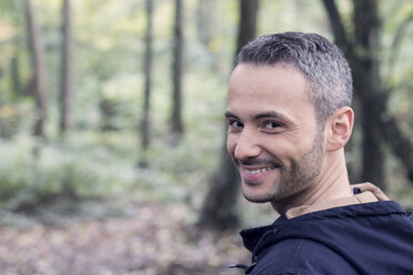 Portrait of smiling man in the woods - DWIF00816
