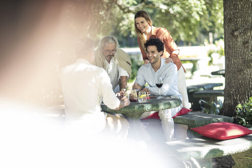 People gathering around chess board - ZEF12320