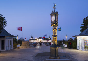 Germany, Usedom, Ahlbeck, view to sea bridge at dusk - SIE07238