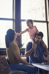 Happy family having fun in the kitchen - WESTF22515