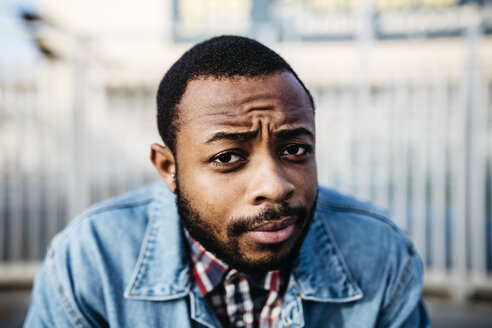 Portrait of sceptical young man - JRFF01146