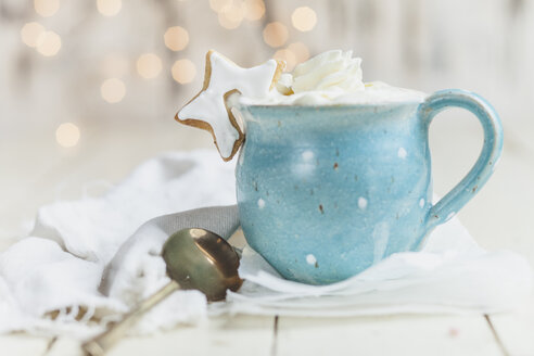 Hot chocolate with whipped cream and star shaped cookie - SBDF03128