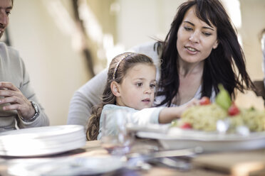 Mother and daughter having family lunch in garden - ZEF12385