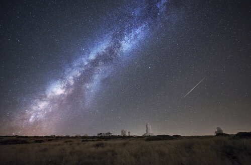 Spain, Tnerife, Milky way and perseid meteor, over Teide Izana astronomical observatory. - DHCF00002