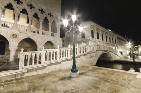 Italy, Venice, bridge over canal at night - DHCF00029
