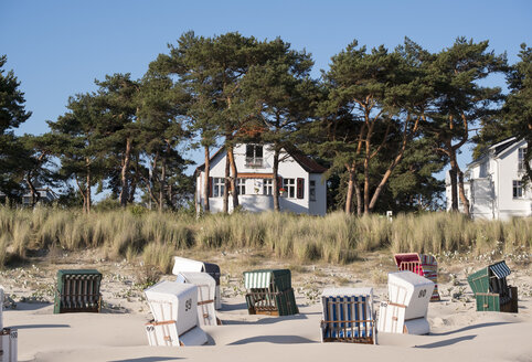 Germany, Usedom, Bansin, hooded beach chair on the beach - SIE07251