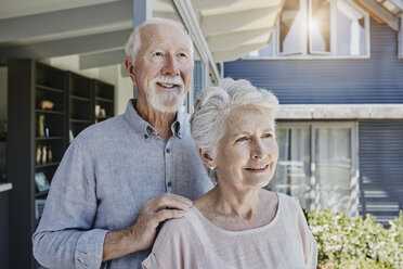 Senoir couple standing in their home, looking confident - RORF00489