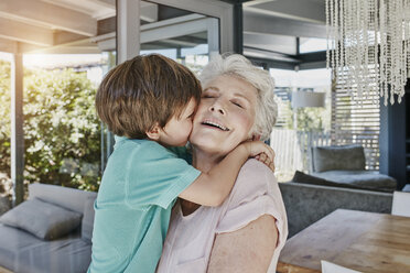 Grandson and grandmother playing with toy airplane - RORF00511