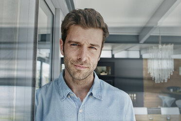 Mid adult man at his home, portrait - RORF00516