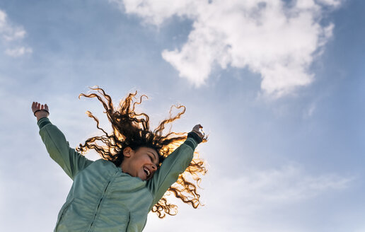 Girl jumping in the air - MGOF02796