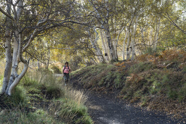 Italy, Sicily, Mount Etna, hiker on trail - HWOF00205