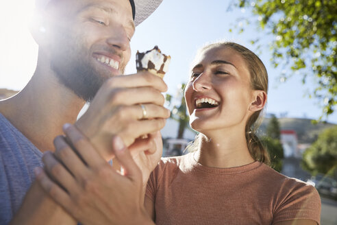 Young couple with ice cream cone - SRYF00252