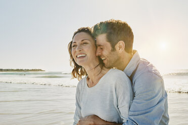 Laughing couple on the beach - RORF00547