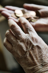 Senior woman's hands with coins - JATF00944